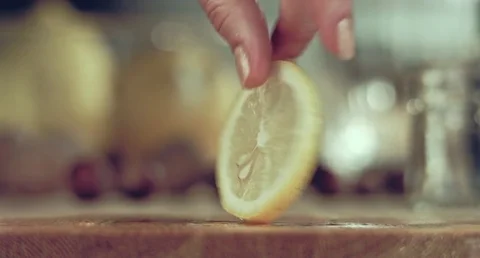 Juicy lemon. Lemon in water splashes. Stock Footage 80245423
