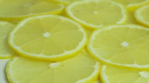 Juicy Lemon Slices, Macro. Sliced Lemon Pieces Rotate. Citrus Fruits, Isolated Stock Footage 264105550