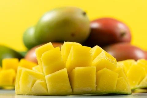 Juicy mango halves with cube cut pattern. 写真素材