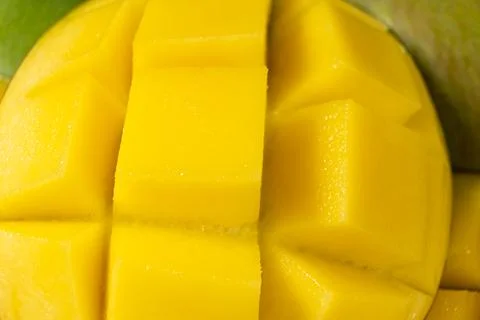 Juicy mango halves with cube cut pattern. 写真素材