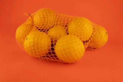 Juicy oranges in a grid Stock Photos