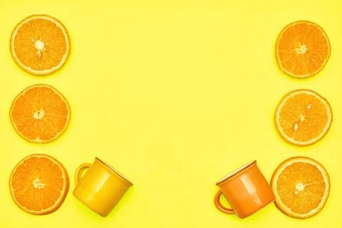 Juicy oranges, two cups. Ready to eat,drink  and cook Stock Photos