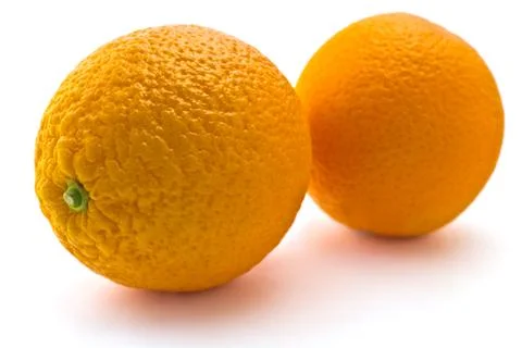 Juicy oranges on a white background Stock Photos