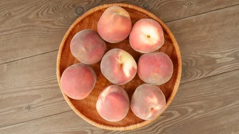 Juicy peaches on the table on the table. Stock Footage 328403322