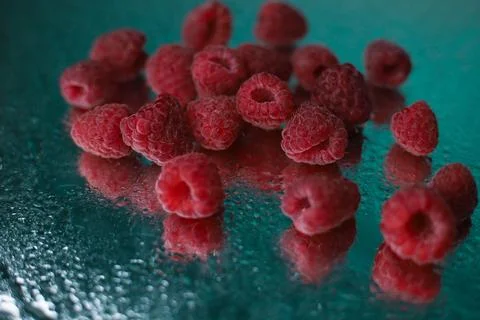 Juicy raspberries Stock Photos