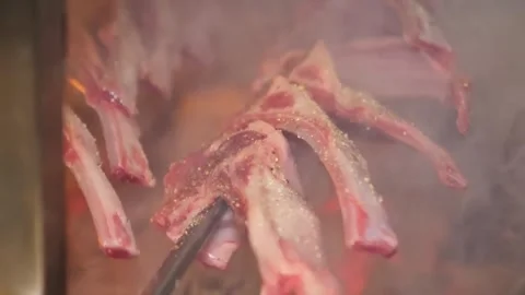 Juicy Raw Mutton Chops on Skewers for Traditional Charcoal Grilling Video stock 332812787