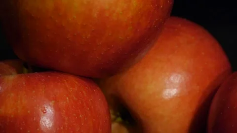 Juicy red apples isolated on a black background. Close up. Delicious fruit. Stock Footage 106204776