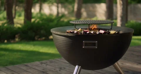 Juicy red meat placed on the grill steak on the flaming grill season Stock-Footage 336575819