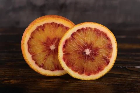 Juicy red orange in a split Stock Photos
