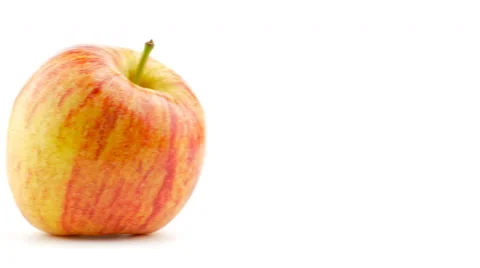 Juicy ripe apple sliding from side to side isolated on white in studio in 4k Stock Footage 47432043