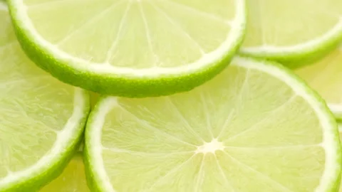 Juicy sliced lime rotating, top view 動画素材 135594049