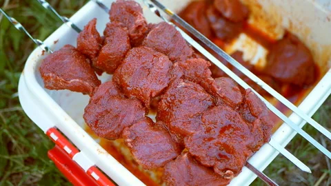 Juicy slices of raw pickled beef meat on a skewer. Cooking kebab. Stock Footage 118200508