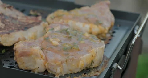 Juicy Steak Grilling, Chef Using Tongs Turns Meat, Pork Entrecote BBQ on Coals Stock Footage 130322211