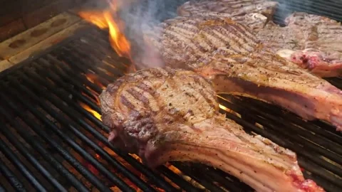 Juicy Tomahawk Steak Grilling Over Open Fire Flames Stock Footage 338213137