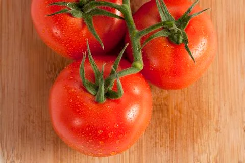 Juicy tomatoes Stock Photos