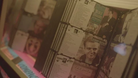 Jukebox details, flipping CDs, picking song Stock Footage 323480358