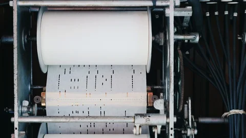 Jukebox mechanism where the melody is programmed on a paper punch card Stock Footage 117668712