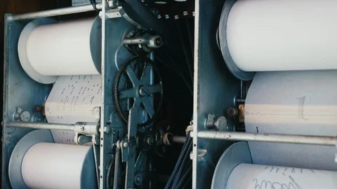 Jukebox mechanism where the melody is programmed on a paper punch card Stock Footage 117668824