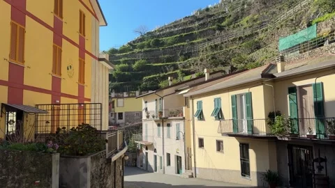 July 15, 2026 - Cinque Terre, Italy - Colorful coastal town overlooking sea Stock Footage 338147501