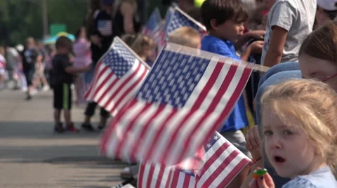 July 4th crowd waiting for parade with flags 4k Stock Footage 52135525