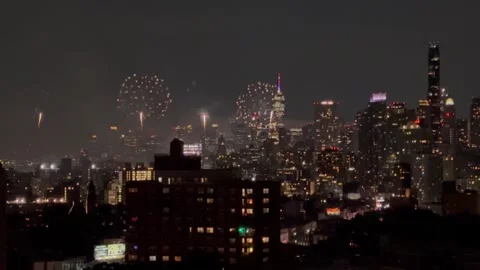 JULY 4TH FIREWORKS VIEWED FROM BROOKLYN ROOFTOP Stock Footage 338361201