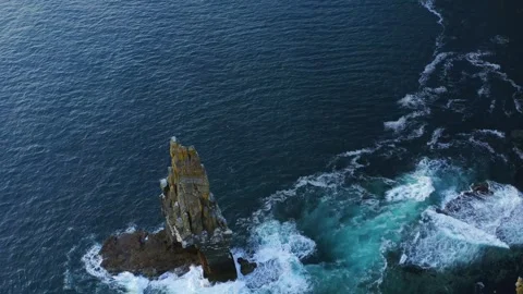 July 7 evening cliffs Clip Aerial Ascent of Sea Stack, Cliffs of Moher at Sunset Stock Footage 291406753