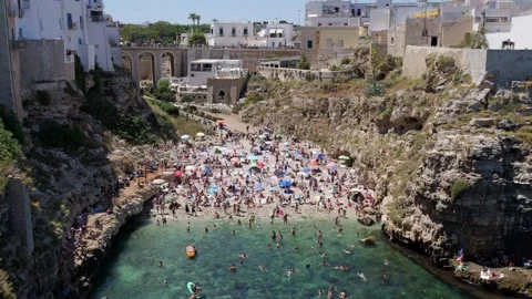July view of monk's blade Beach in Polignano a Mare, Italy Stock Footage 315337328