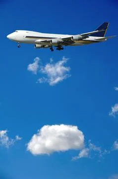 Jumbo and clouds Stock Photos