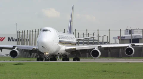 Jumbo Boeing 747 lining up for take-off Stock Footage 32343320