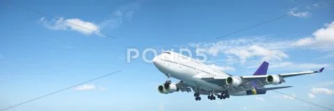 Jumbo jet aircraft in a blue sky Stock Photos