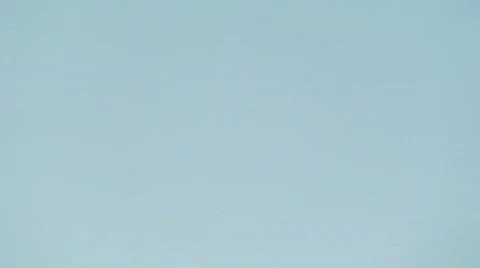 Jumbo jet flies through frame Stock-Footage 112635