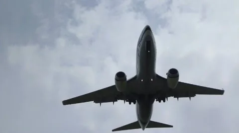 Jumbo Jet Flying Overhead Stock-Footage 10978939