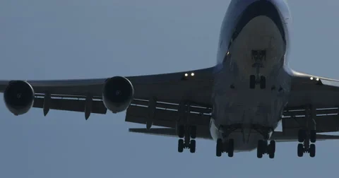 Jumbo Jet Flying Overhead Stock Footage 55275797