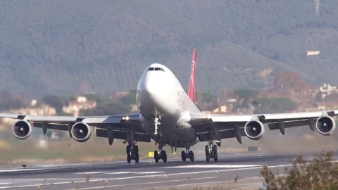 Jumbo Jet heavy cargo plane takeoff, front view, super zoom Stock Footage 89488893