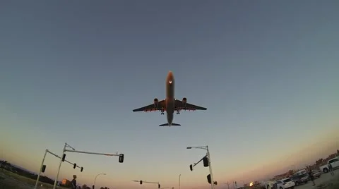 Jumbo Jet landing at sunset Stock Footage 40732390