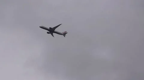 Jumbo Jet Plane flying into the clouds Video stock 64798704