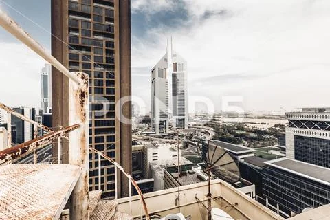 Jumeirah Emirates Towers in Dubai from rooftop. Stock Photos