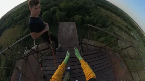 Jump from a 30-meter tower in the first person with a rope Stock Footage 196032897