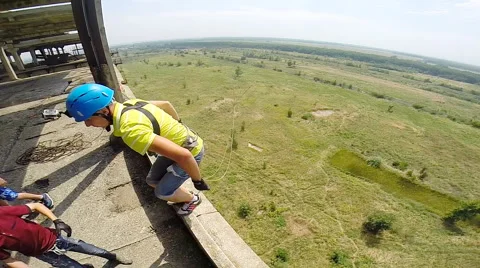 Jump backwards with your back straight and hands divorced Stock Footage 68069537