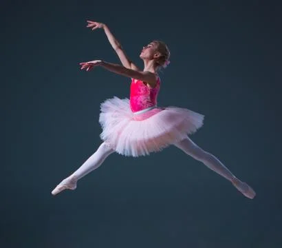 The jump of beautiful female ballet dancer Stock Photos
