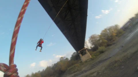 Jump off the bridge and swinging pendulums Stock Footage 34363431
