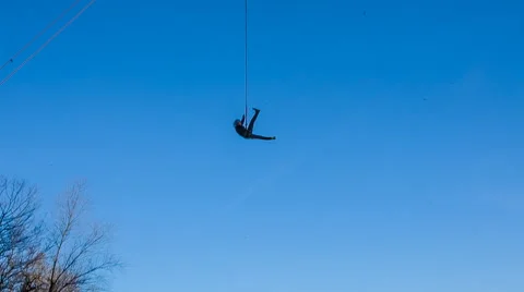 Jump from the bridge with the coup against the blue sky Stock Footage 46996280
