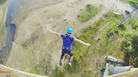 Jump from the bridge facing forward straight down Stock Footage 53349935