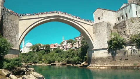 Jump from the bridge to the river Stock Footage 138680619