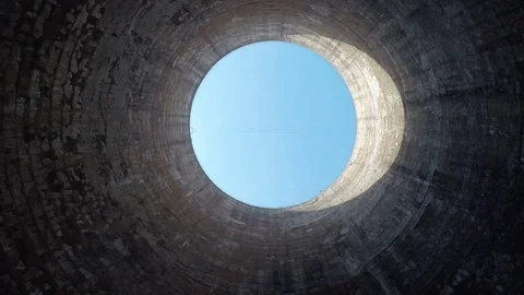 Jump into a cooling tower from bottom Stock Footage 122890173