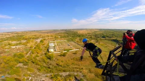 Jump from a factory pipe arms spread Stock Footage 42419421