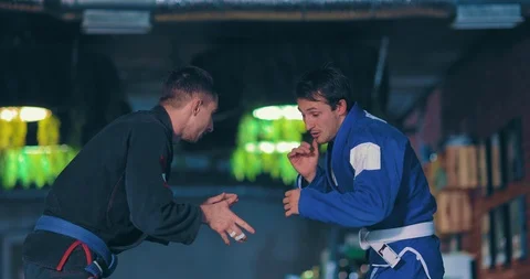 Jump fighter on the opponent with the fall of the enemy. Painful technique on Stock Footage 121016755