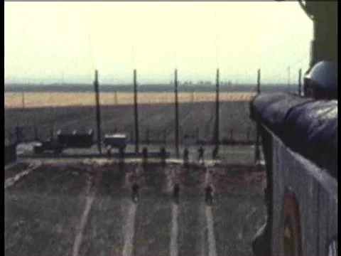 A jump master instructs his students in a parachute simulation, and paratroopers Stock Footage 74965752