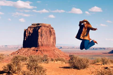 Jump at monument valley Stock Photos