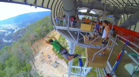 Jump over a mountain gorge with a suspension bridge 69 m Stock Footage 42862083